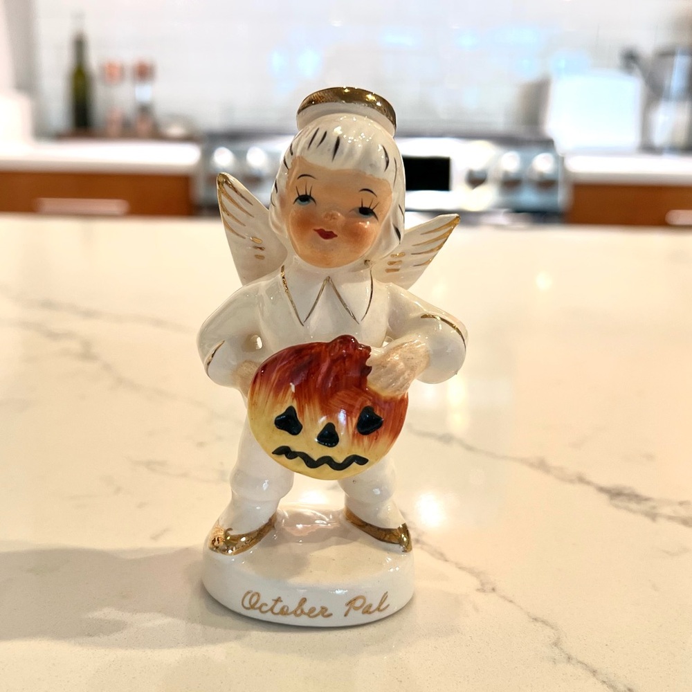 Ceramic Angel Figurine with Pumpkin